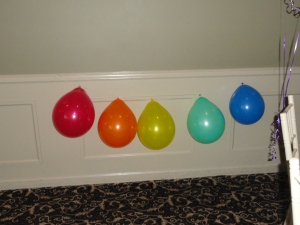 M&M colored balloon banner