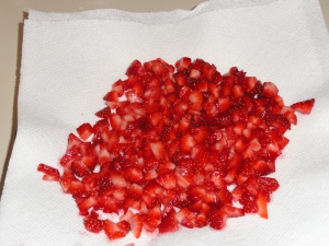 Chopped up Strawberries on paper towels